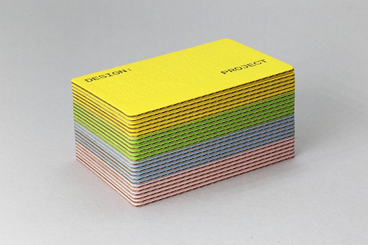 design project letterpress business cards gmund volume deboss die cut cards fanned stack detail 750